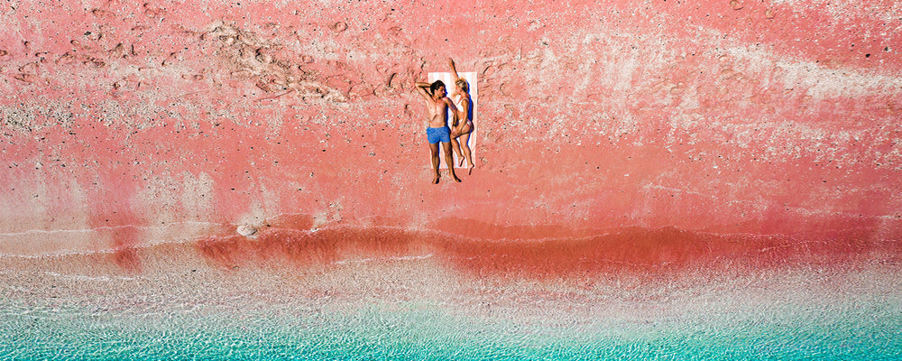 sand free beach towel couple on the red beach